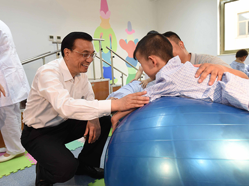 這三年，總理牽掛的殘疾人群體，迎來哪些暖政？