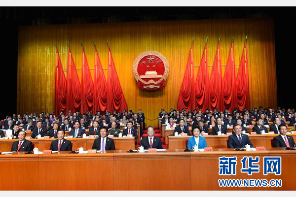 10月1日，慶祝中華人民共和國成立66周年暨新疆維吾爾自治區(qū)成立60周年大會在新疆人民會堂隆重舉行。 新華社記者 饒愛民 攝