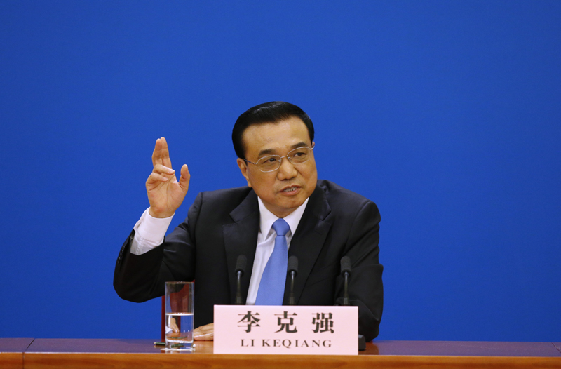 3月15日，國務院總理李克強在北京人民大會堂與中外記者見面，并回答記者提問。 新華社記者 沈伯韓 攝