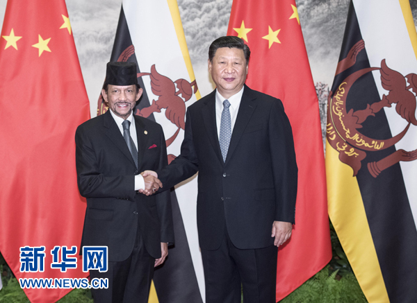 9月13日，國(guó)家主席習(xí)近平在北京人民大會(huì)堂同文萊蘇丹哈桑納爾舉行會(huì)談。 新華社記者 李濤 攝