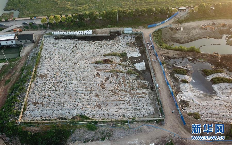 （新華視點&middot;圖文互動）（1）中央督察兩年有的絲毫未改，有的不減反增&mdash;&mdash;江蘇泰興數(shù)萬噸化工廢料和污泥堆放長江邊調(diào)查