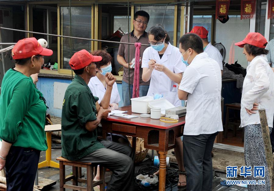 (紅土地“往事新說”·圖文互動)(9)昔日送“瘟神” 今朝健康促小康
