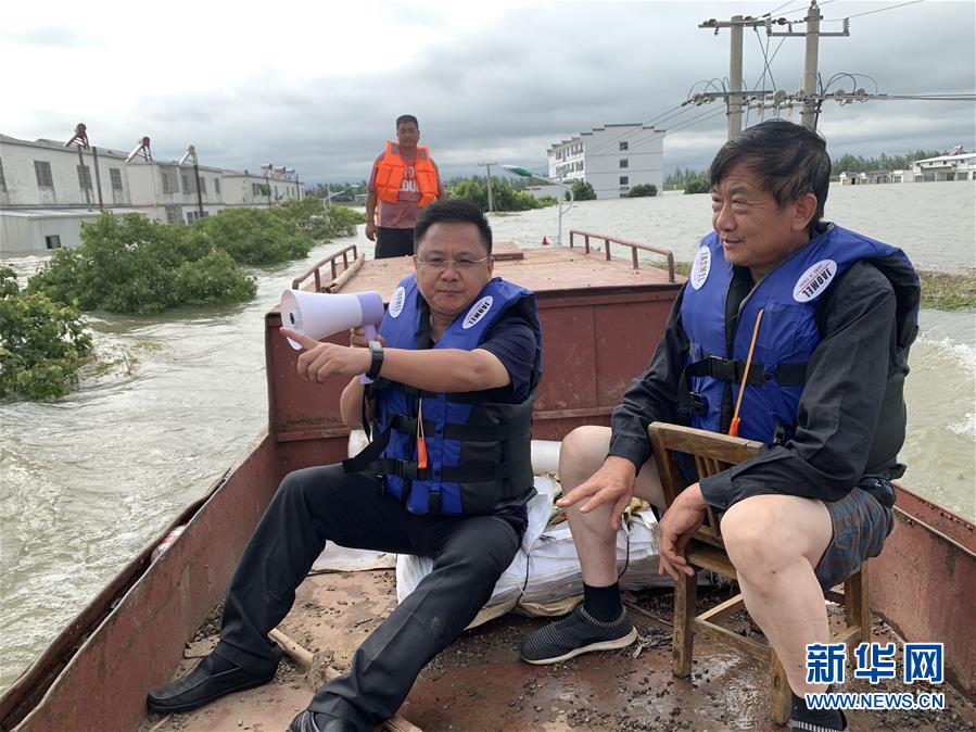 (新華全媒頭條·圖文互動(dòng))(1)筑起共御水患的鋼鐵長堤——戰(zhàn)洪一線的“干群關(guān)系新答卷”