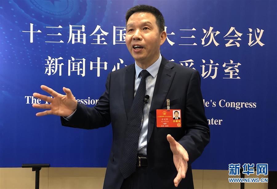 （兩會&middot;熱點畫報）（8）代表委員建言統(tǒng)籌做好經濟社會發(fā)展工作