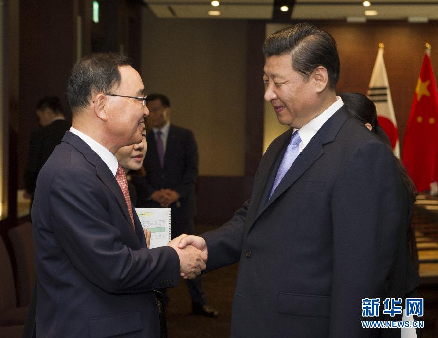 7月4日，國家主席習(xí)近平在首爾會(huì)見韓國總理鄭烘原。 新華社記者謝環(huán)馳攝  