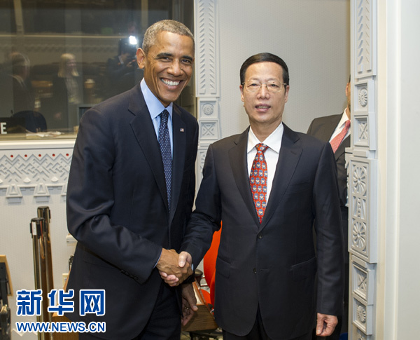 9月23日，國家主席習近平特使、國務院副總理張高麗在紐約會見出席聯(lián)合國氣候峰會的美國總統(tǒng)奧巴馬。 新華社記者王曄攝