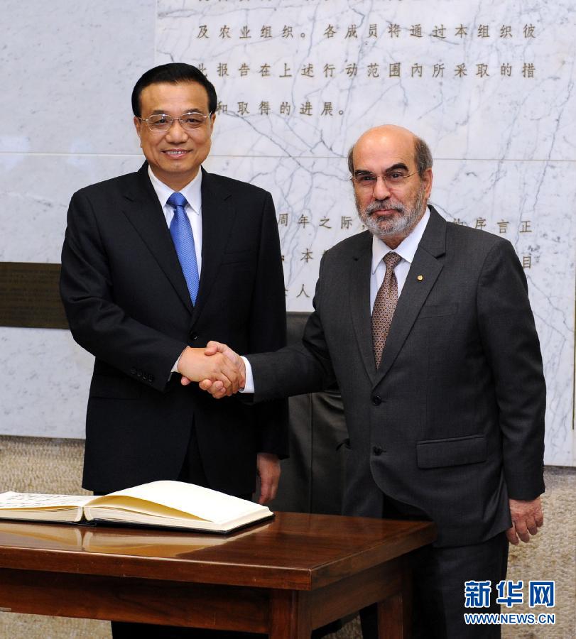 10月15日，中國國務院總理李克強在羅馬會見聯(lián)合國糧農(nóng)組織總干事格拉齊亞諾。 新華社記者 饒愛民 攝