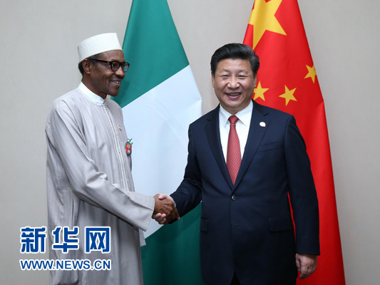 12月4日，國(guó)家主席習(xí)近平在約翰內(nèi)斯堡會(huì)見(jiàn)尼日利亞總統(tǒng)布哈里。 新華社記者 龐興雷 攝 