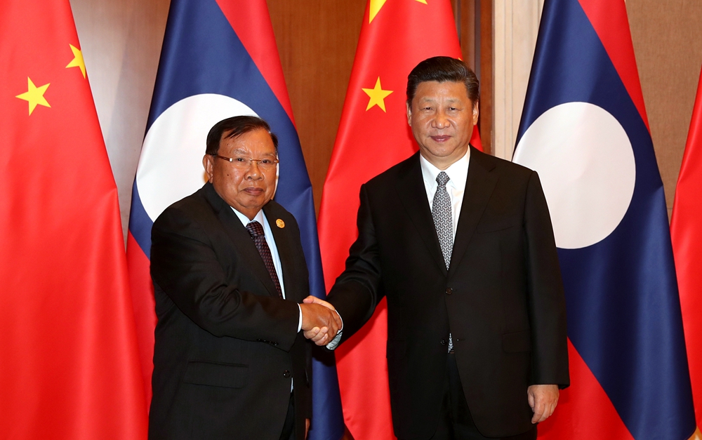 習(xí)近平同老撾人民革命黨中央總書記、國家主席本揚(yáng)舉行會(huì)談