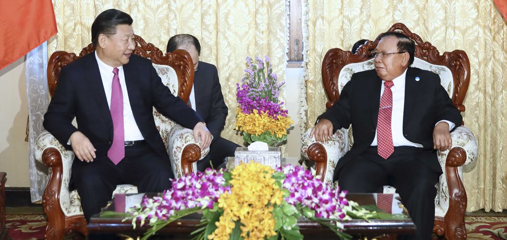 習(xí)近平同老撾人民革命黨中央委員會(huì)總書記、國家主席本揚(yáng)舉行會(huì)談